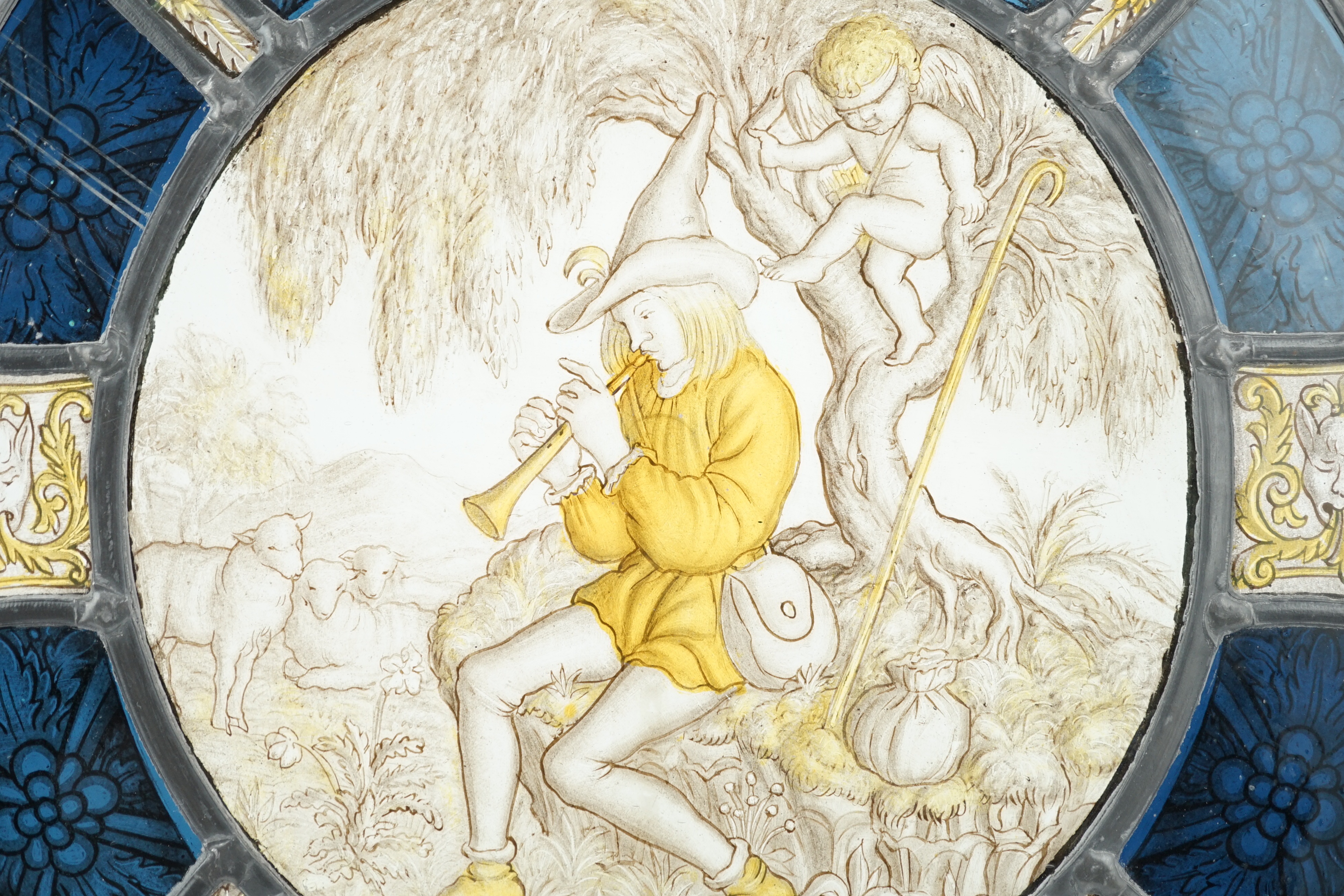 An 18th century Flemish stained glass panel, 32cm diameter